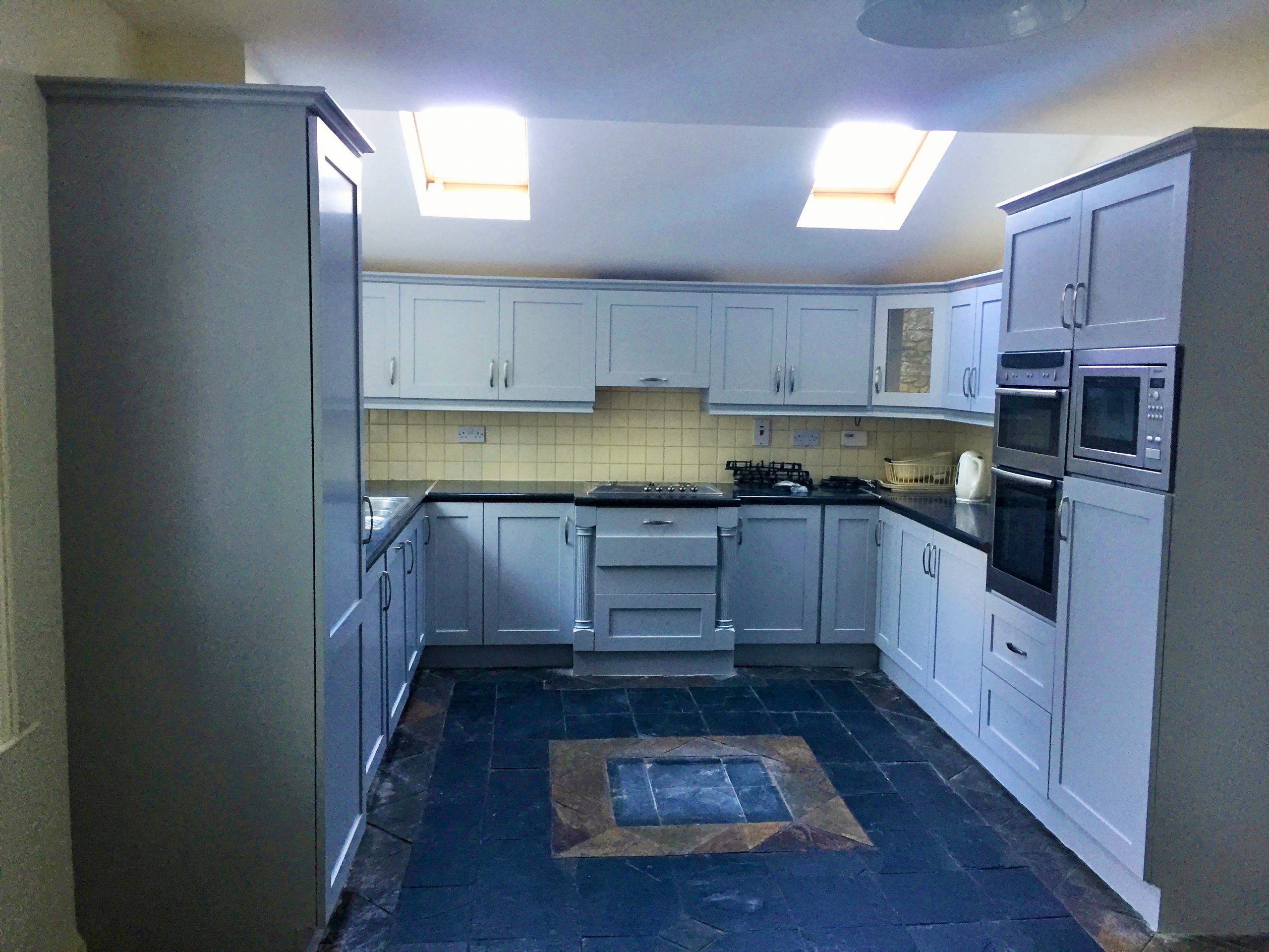 How to paint a laminated surfaces - after photo of a laminated kitchen we painted in Sandycove by Impressions Painting and Decorating