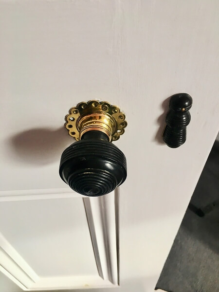 A doorknob on a period door in Terenure after being restored by Impressions painting and decorating