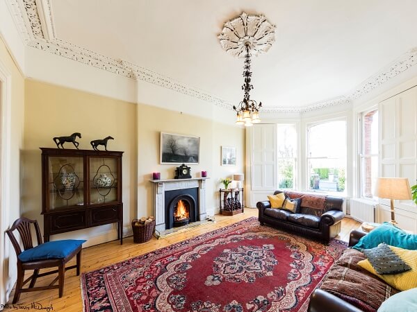 A living room in a period house in Glenageary restored and painted by Impressions Period House Painters and Decorators Dublin - Photo by Terry McDonagh