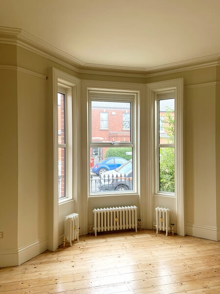 A period bay sash window after being painted and restored by Impressions Painting and Decorating in Drumcondra