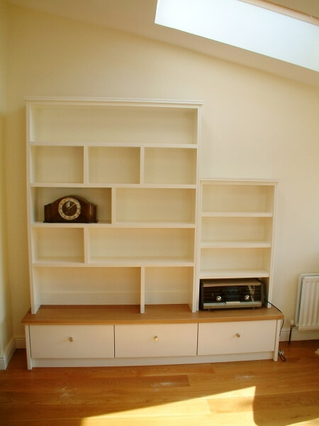 Bespoke hand painted book shelves painted by Impressions Painters and Decorators in Glenageary