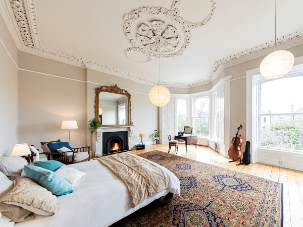 Fully restored and decorated master bedroom in a period house in Glenageary by Impressions painting and decorated