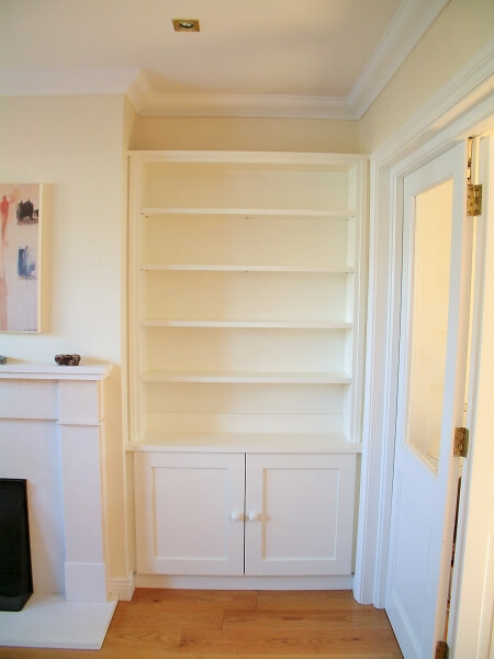 Hand painted bespoke bookcase painters by Impressions trusted furniture painters in Glenageary