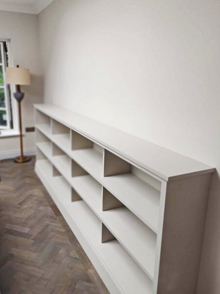 Hand-painted bookshelf painters in Dublin Impressions living room shelves painters