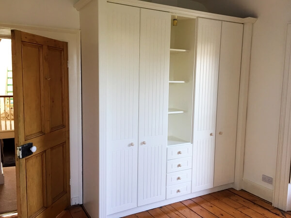 Hand painted laminated bedroom wardrobe painted by Impressions Painting and Decorating in Sandycove