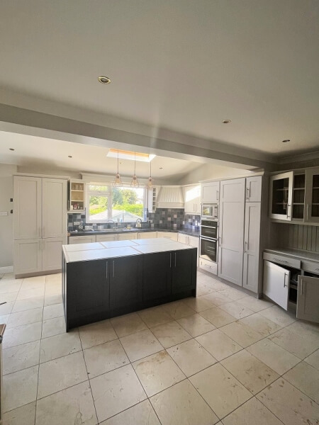 Oak-wooden-kitchen-cupboards-after-being-hand-painted-by-Impressions-painters-and-decorators