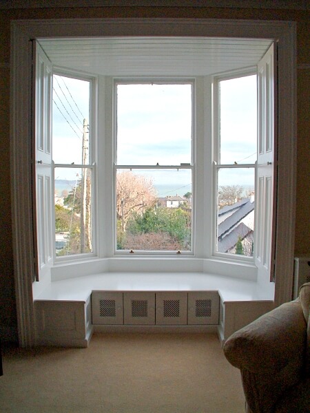 Painting and restoration of a period bay sash window and shutters by Impressions Painters and decorators in Dalkey South Dublin