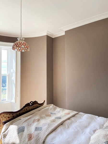 Period house bedroom in Clontarf with ceiling restored and painted by expert period house painters Impressions painters and decorators