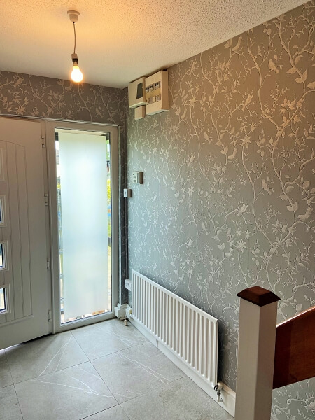 Re-decorated and wallpapered halls stairs and landing by Impressions Painters and Decorators wallpaper hangers Dublin