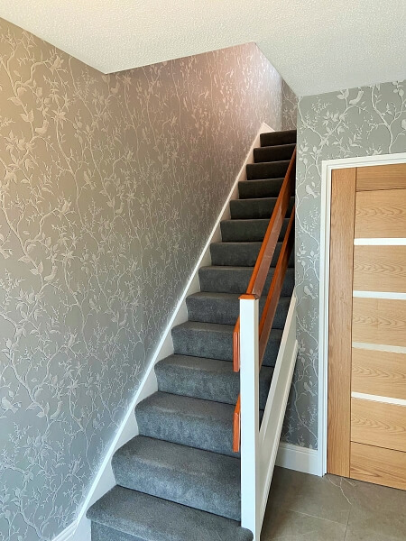 Wallpapered halls and stairs by expert wallpaper hangers in Shankill Dublin Impressions Painters and Decorators