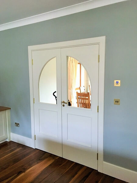 Wooden inside door after being painted by Impressions painters and decorators in Kilmacanogue