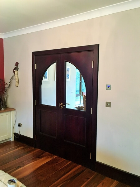 Wooden inside door before being painted by Impressions painters and decorators in Kilmacanogue