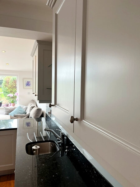 Handpainted bespoke above kitchen counter cabinets in Glenageary by Impressions Painters and Decorators near me