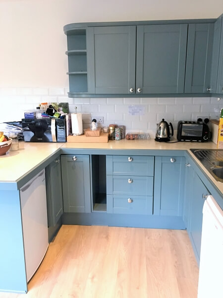 Handpainted kitchen cabinets after being painted by Impressions cabinet painters in Ranelagh near me