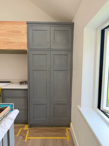 Kitchen cabinet before being hand painted by Impressions Painting and Decorating