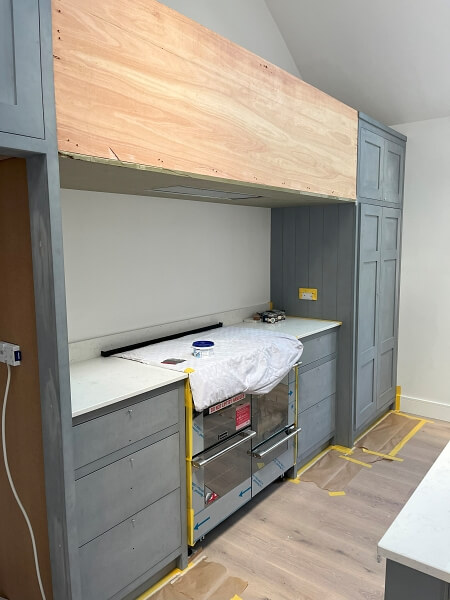 Kitchen cabinet unit before being hand painted by Impressions Painting and Decorating