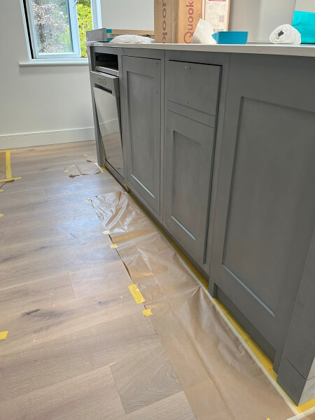 Kitchen cupboards before being hand painted by Impressions Painting and Decorating