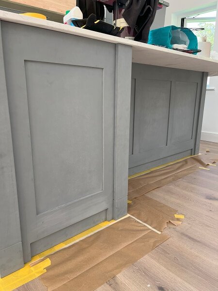 Kitchen island before being hand painted by Impressions Painting and Decorating