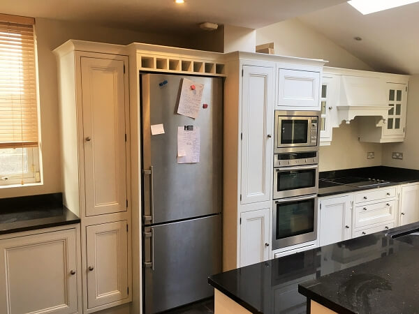 Wooden kitchen cabinets after being painted by Impressions Clontarf kitchen painters and decorators