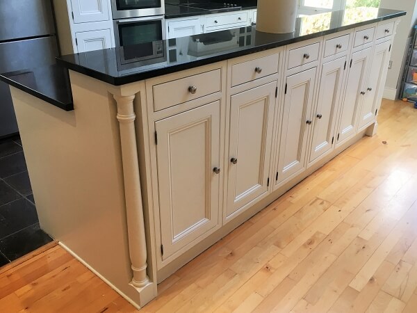 Wooden kitchen island after being painted by Impressions Clontarf kitchen island painters and decorators
