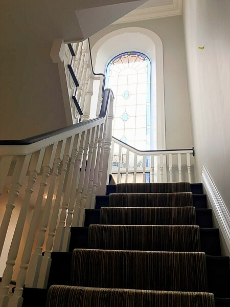 Hallway and stairs and bannisters painted and decorated by Impressions Painters and Decorators in South Dublin