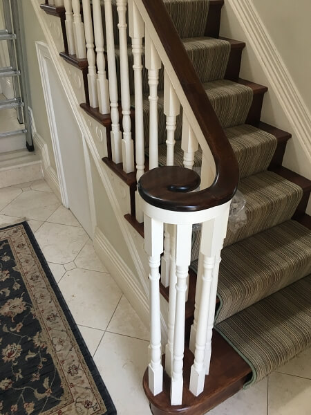 Stairs and bannisters before being restored and hand-painted by Impressions Stair Painters and Decorators