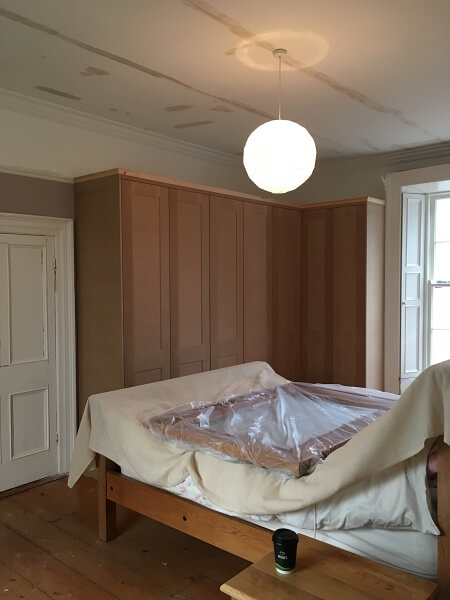 Before photo of a new bedroom wardrobe hand painted by Impressions Painting and Decorating Killiney